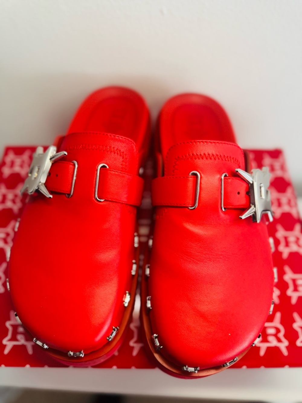 Red Leather Slip-On Sneakers with Silver Buckle